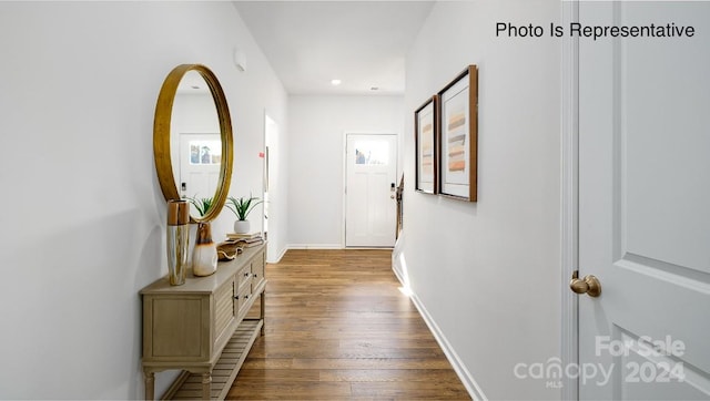 hallway featuring hardwood / wood-style floors