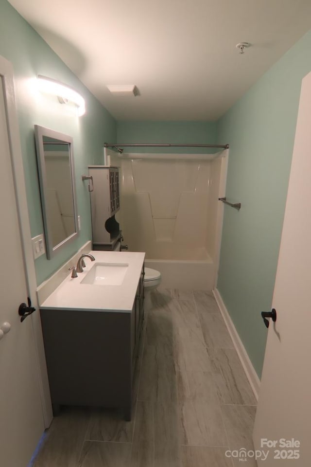 full bathroom with vanity, shower / bathtub combination, and toilet