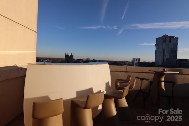 view of patio / terrace featuring a balcony