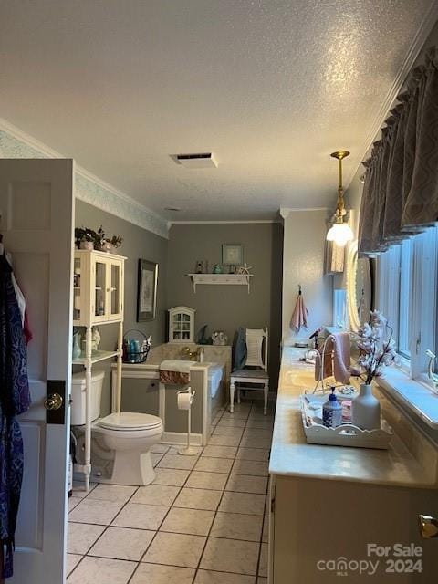 bathroom with tile patterned flooring, toilet, a textured ceiling, and ornamental molding