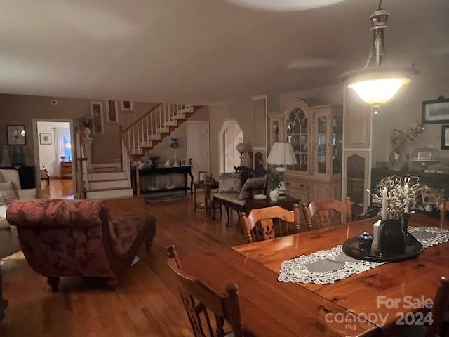 dining room with hardwood / wood-style flooring