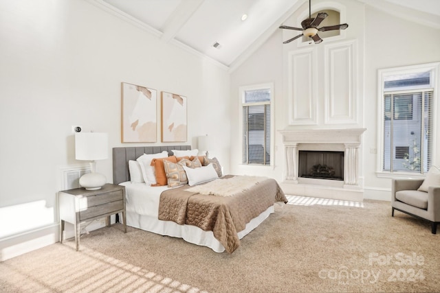 bedroom with ceiling fan, high vaulted ceiling, carpet flooring, and beam ceiling