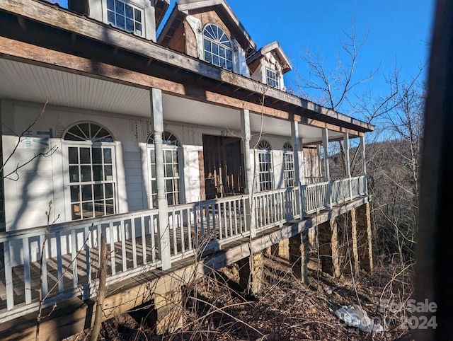 view of home's exterior with a porch