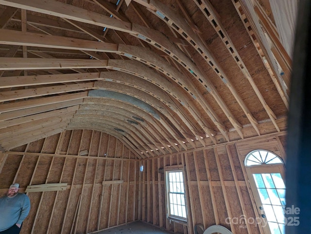 misc room with lofted ceiling