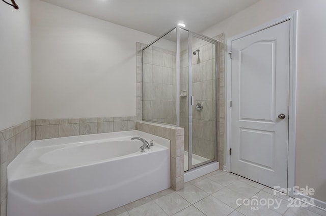 bathroom with plus walk in shower and tile patterned floors