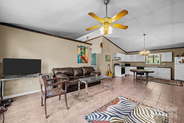 tiled living room with ceiling fan with notable chandelier, lofted ceiling, ornamental molding, and sink