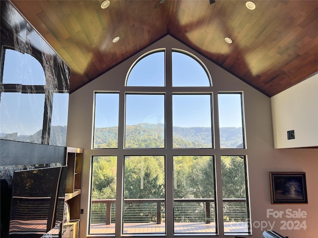 room details featuring a mountain view and wood ceiling