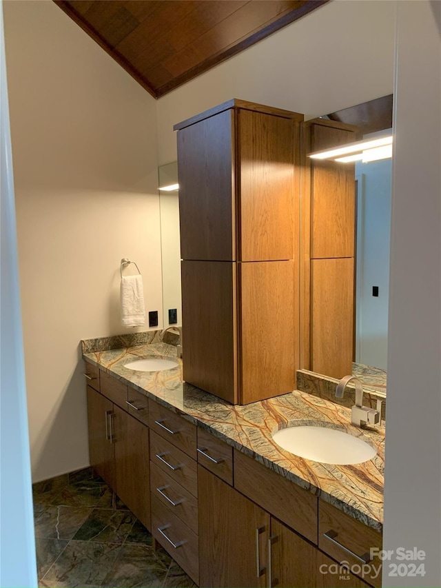 bathroom with vanity and wood ceiling