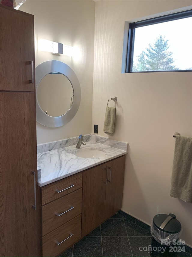 bathroom featuring vanity and tile patterned floors