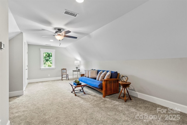 interior space with carpet flooring, vaulted ceiling, and ceiling fan