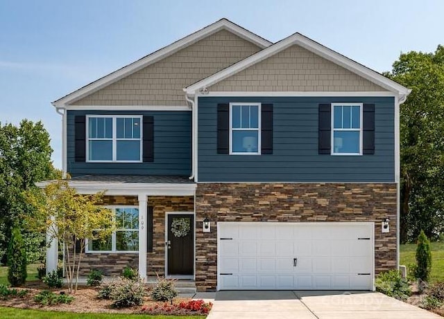 craftsman house featuring a garage