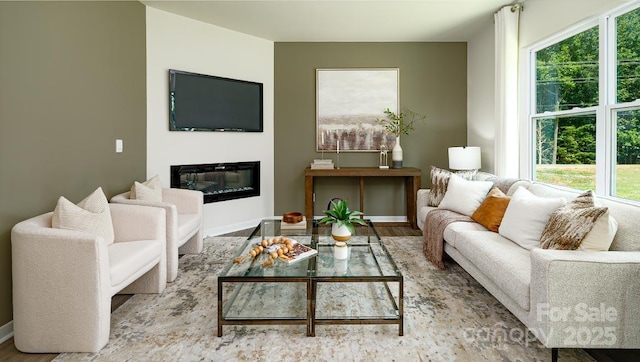 living room featuring light hardwood / wood-style floors and plenty of natural light