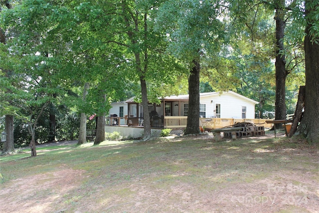 view of yard featuring a deck