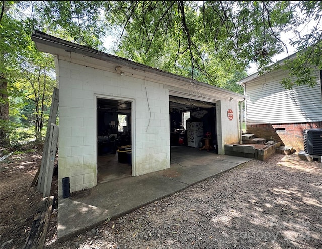 garage featuring central AC unit