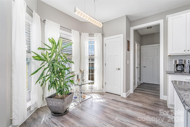 dining area with light hardwood / wood-style flooring