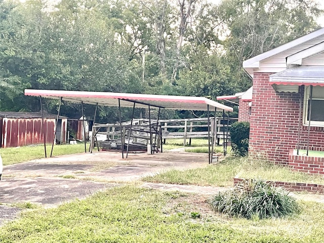 view of home's community featuring a lawn