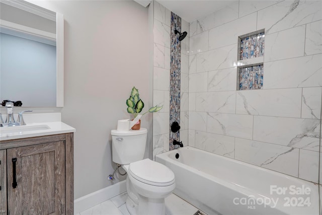 full bathroom with baseboards, marble finish floor, toilet, vanity, and shower / bathtub combination