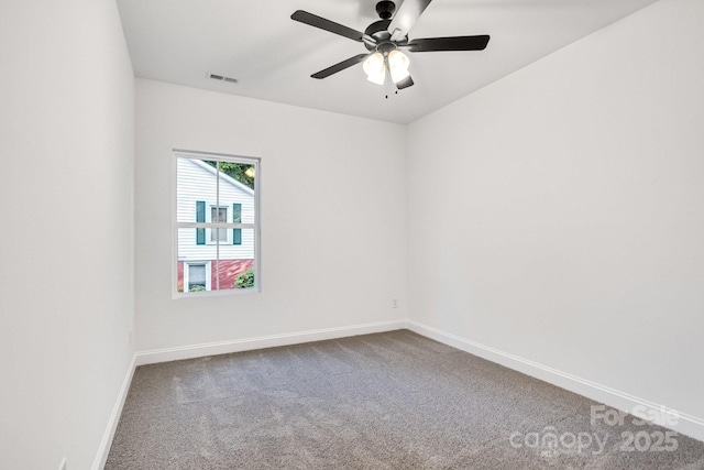 empty room featuring carpet and ceiling fan