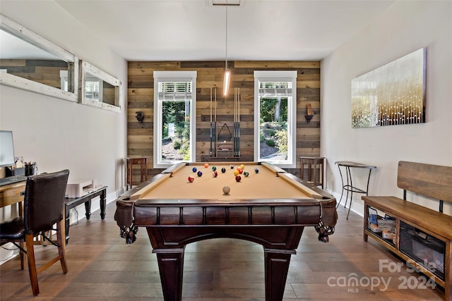 recreation room with pool table, dark hardwood / wood-style flooring, and wooden walls