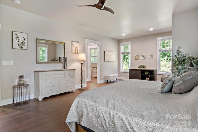 bedroom with dark wood-type flooring and ceiling fan