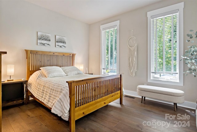 bedroom featuring dark wood-type flooring