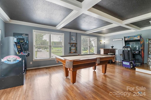 game room featuring ornamental molding, hardwood / wood-style flooring, pool table, and beam ceiling