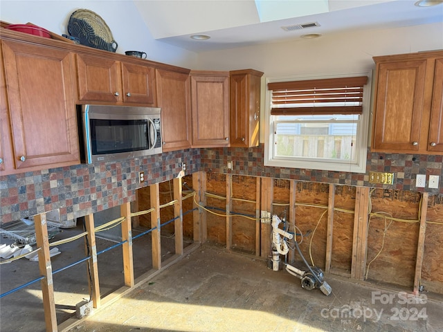 kitchen with tasteful backsplash