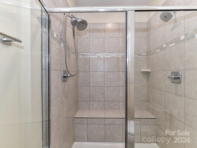 bathroom featuring walk in shower