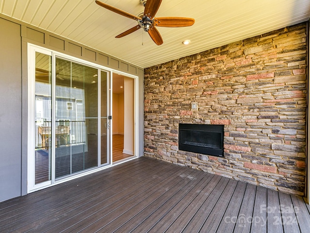 wooden deck with ceiling fan