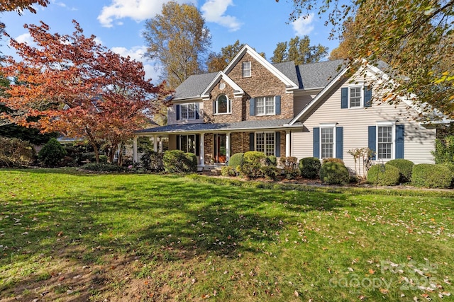 view of front of home with a front yard