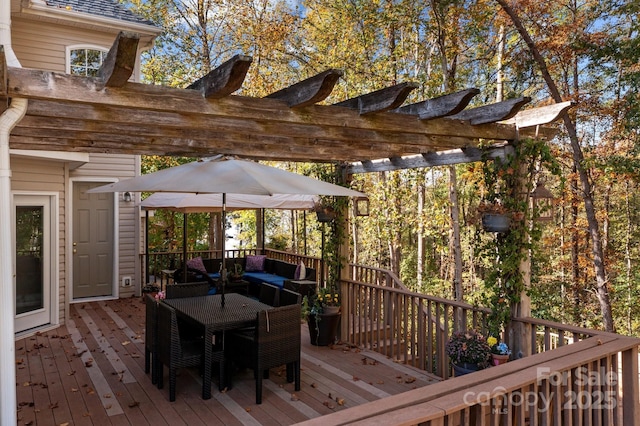 wooden deck featuring a pergola