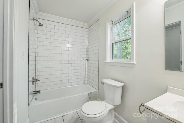 full bathroom featuring tiled shower / bath, toilet, ornamental molding, and vanity