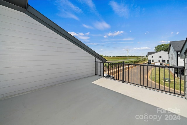 view of patio / terrace with a balcony