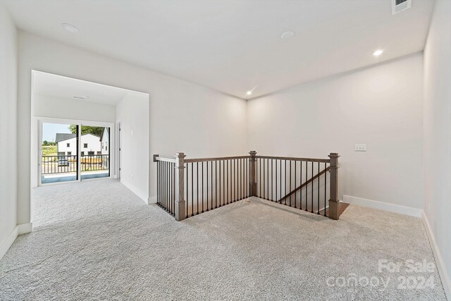 corridor with carpet floors