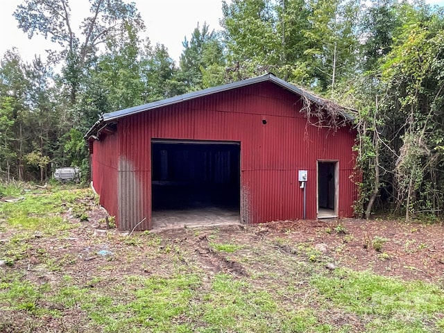 view of outdoor structure with a garage