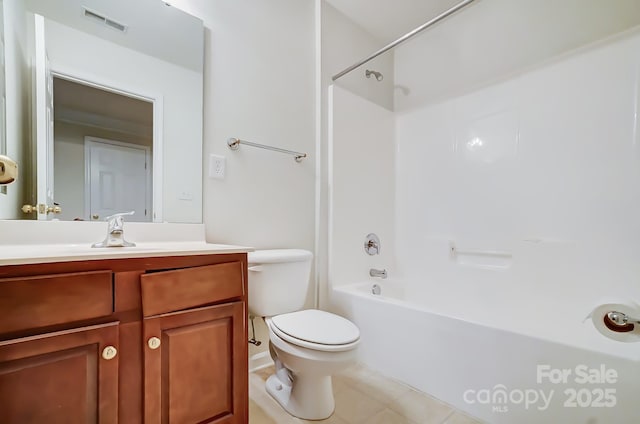 full bathroom with vanity, toilet, and  shower combination