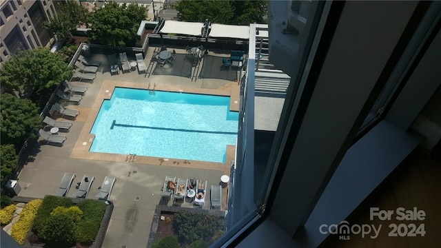 view of pool with a patio area