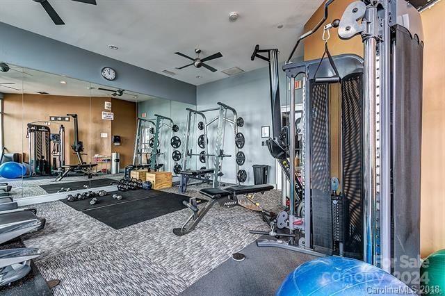 exercise room featuring ceiling fan