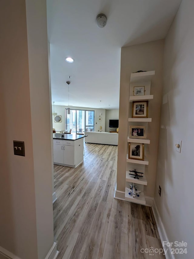 hall featuring light wood-type flooring