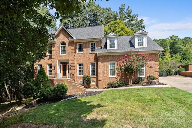 view of front of house with a front yard