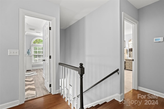 hallway featuring hardwood / wood-style flooring