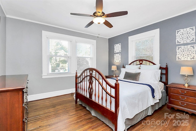 bedroom with ceiling fan, dark hardwood / wood-style flooring, and crown molding