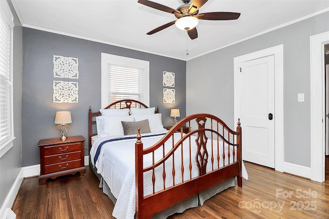 bedroom with ceiling fan, wood-type flooring, and crown molding