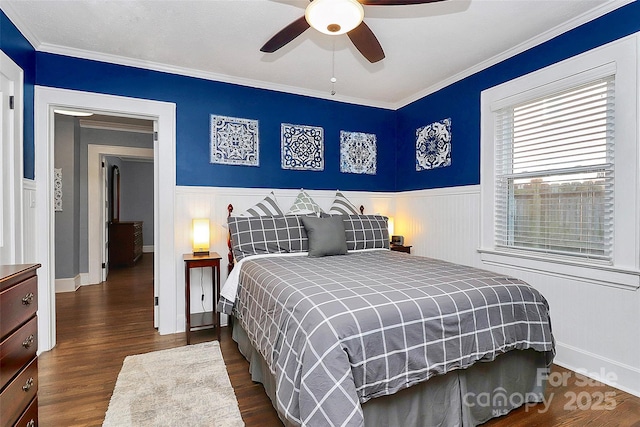 bedroom with ceiling fan, dark hardwood / wood-style flooring, and crown molding