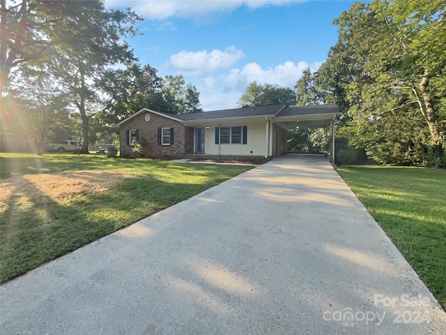 ranch-style home with a front lawn