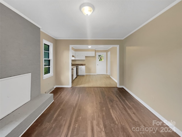 interior space with crown molding and dark hardwood / wood-style floors