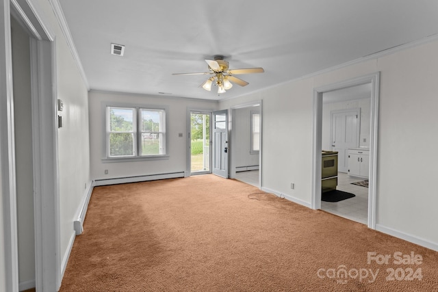 unfurnished bedroom featuring crown molding, light colored carpet, ceiling fan, and a baseboard heating unit