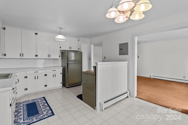 kitchen featuring a baseboard heating unit, stainless steel fridge, white cabinetry, and hanging light fixtures