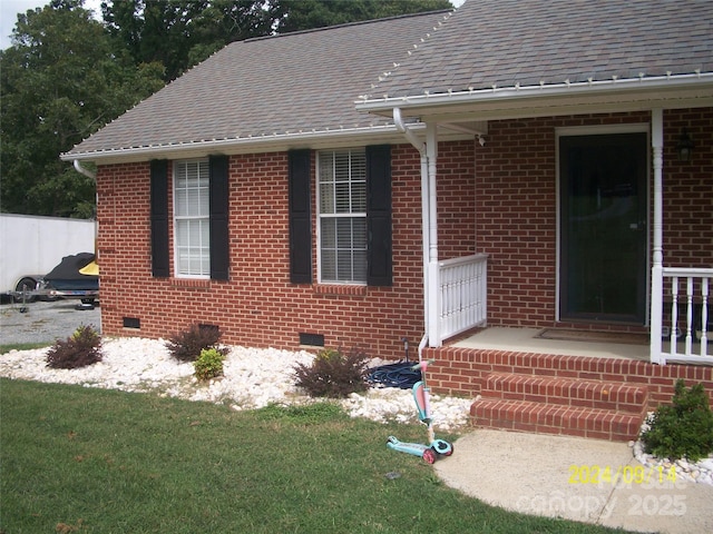 exterior space featuring a front lawn