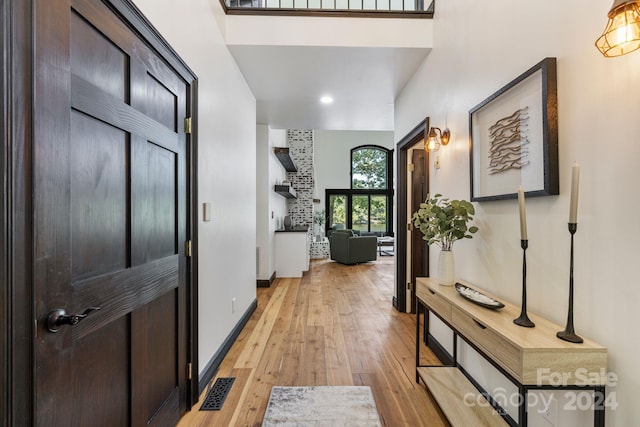 hall featuring light hardwood / wood-style floors